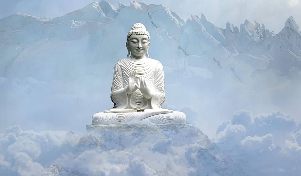 Big Buddha statue in the clouds of Himalayas.